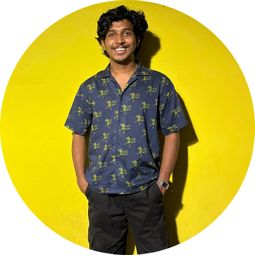 Team member from Sagamiles travel packages wearing a tropical shirt and smiling